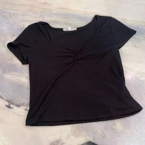 macys black baby tee size L
